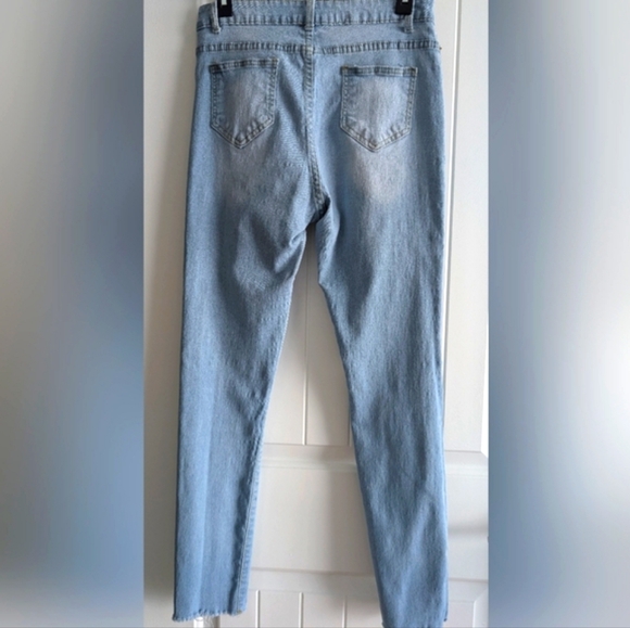 Distressed Light Blue Jeans - Picture 2 of 5
